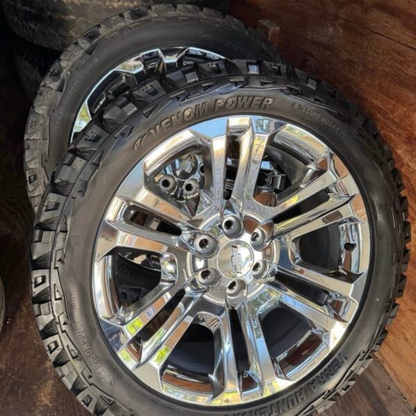 22 inch Chevy wheels and 33 inch
venom tires