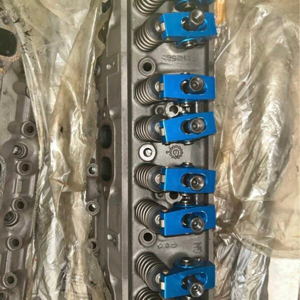 Chevy 350 small block performance heads with performance roller rockers.